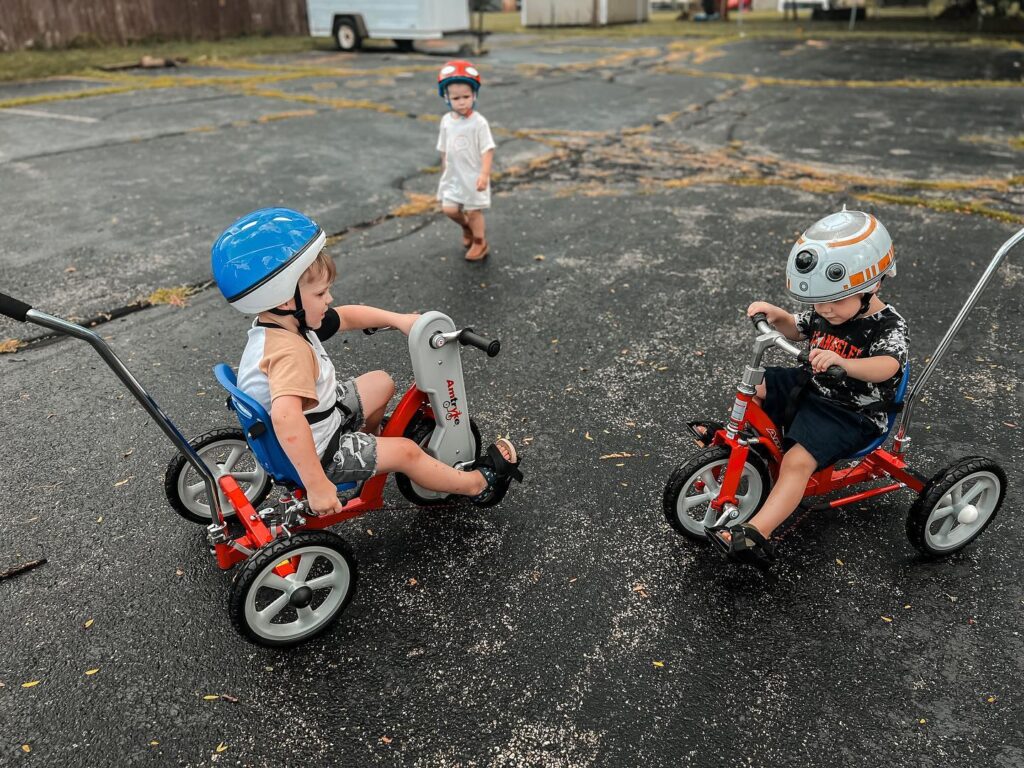 Two AmTryke recipients enjoy their new-found mobility.